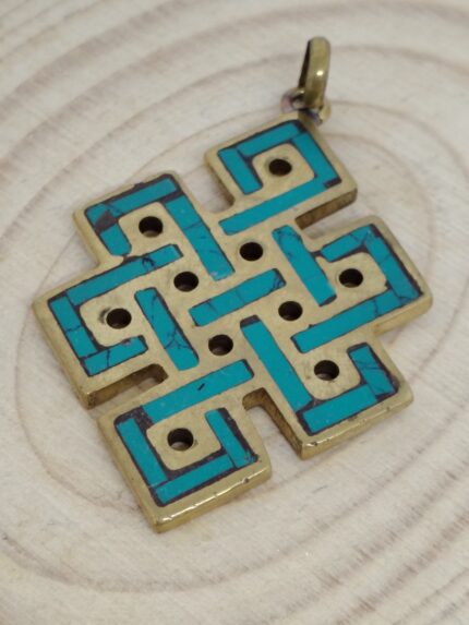 DIJE TURQUESA NUDO COMPASIÓN